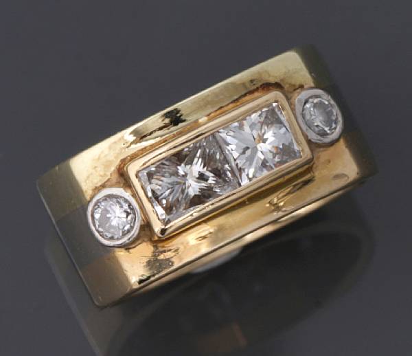 Appraisal: A diamond and tri-color k gold band set with full