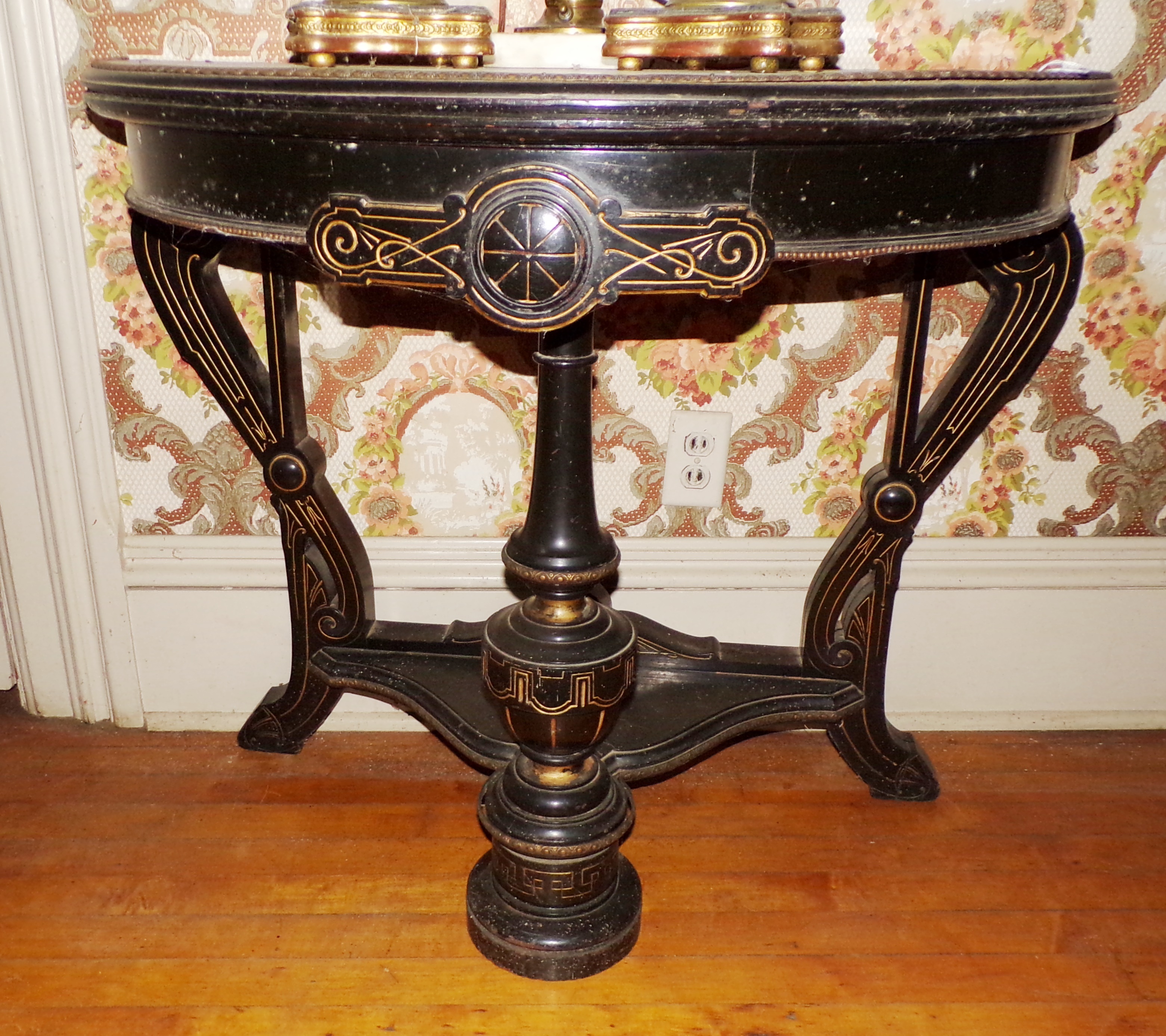 Appraisal: Victorian demilune table flip top black lacquer wear on post