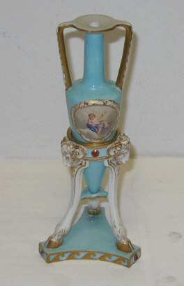 Appraisal: BERLIN PORCELAIN MINIATURE AMPHORA Typical two-handled conical shape with two