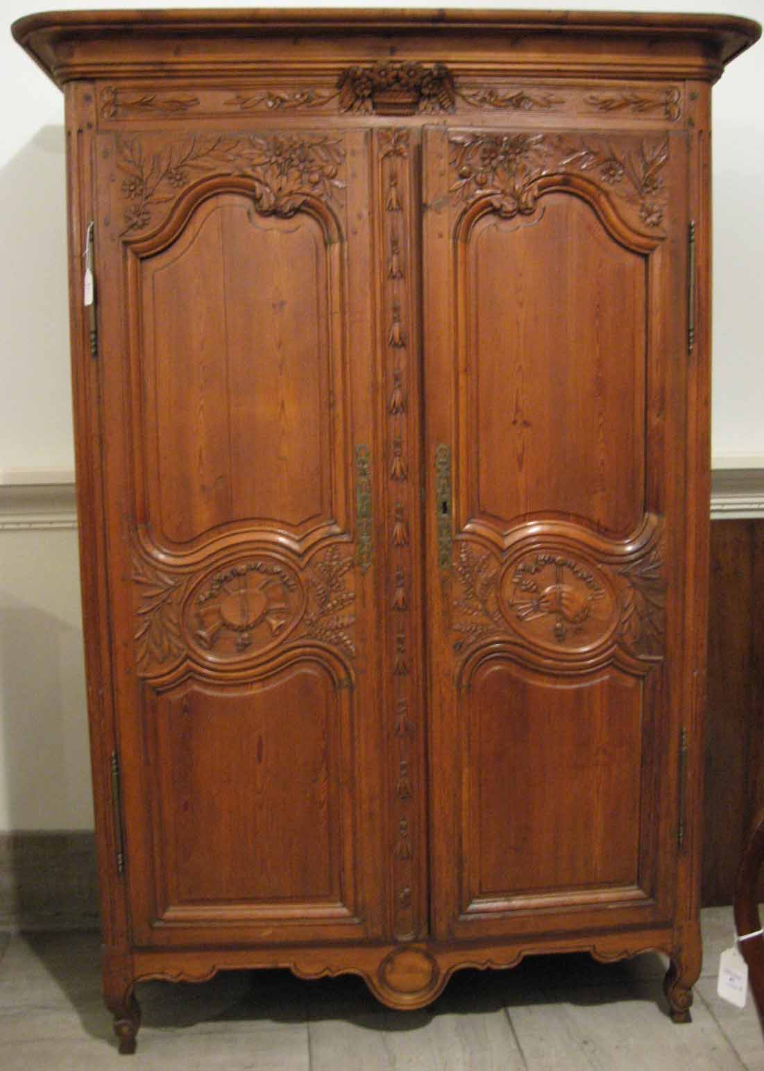 Appraisal: Provincial Louis XVI style pine armoire The molded cornice above