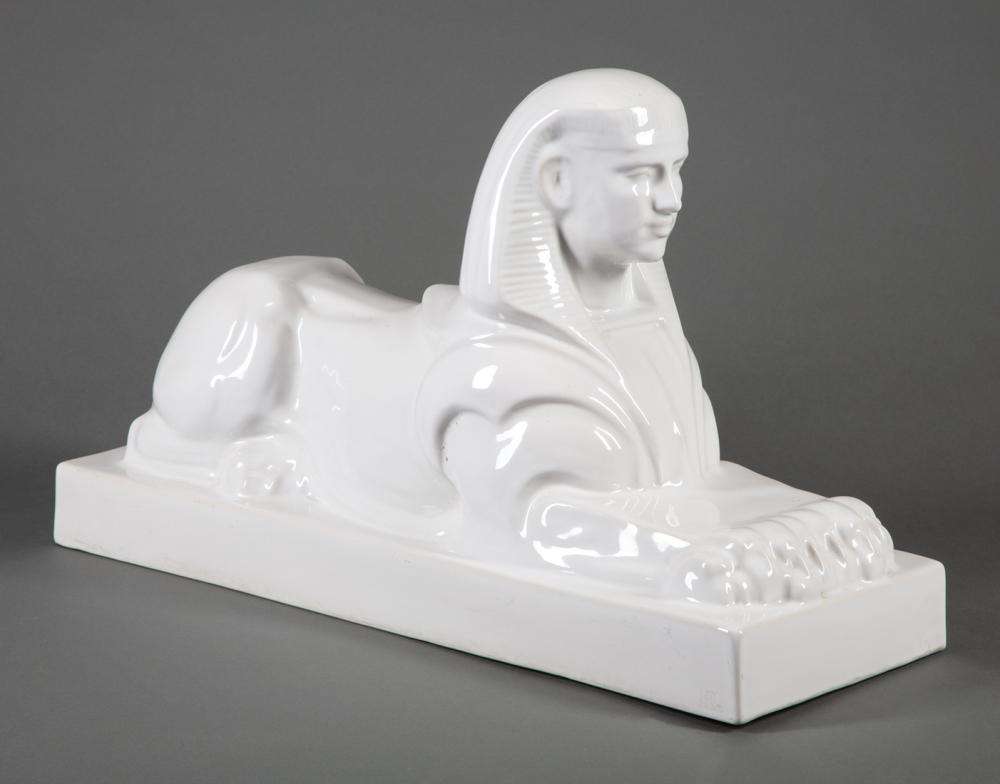 Appraisal: Continental Glazed Ceramic Sphinx plinth base h in w in