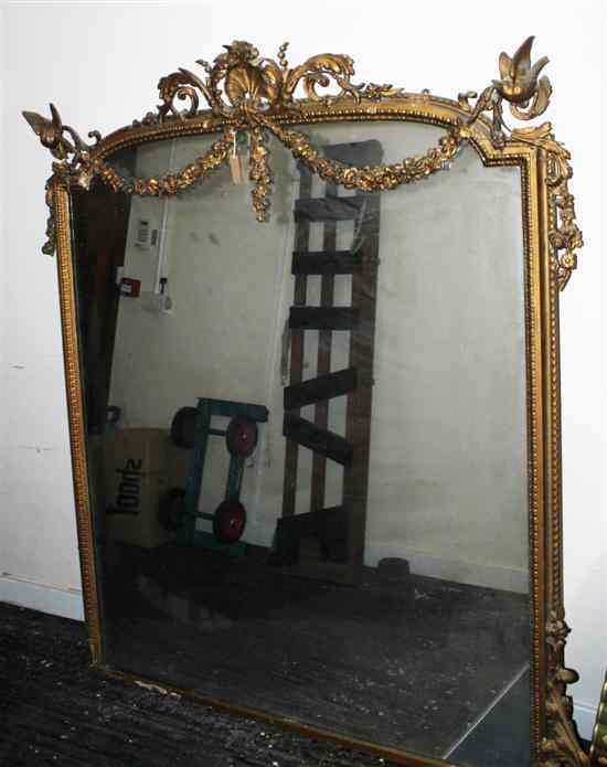 Appraisal: A Victorian carved giltwood and gesso overmantel mirror the elaborate