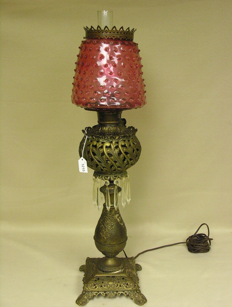 Appraisal: VICTORIAN PARLOR LAMP CRANBERRY SHADE Base marked Pat Applied For