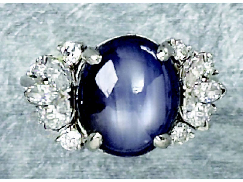 Appraisal: STAR SAPPHIRE AND DIAMOND RING k white gold ring set