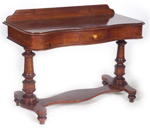 Appraisal: VICTORIAN MAHOGANY SERVING TABLE the serpentine top fitted with a