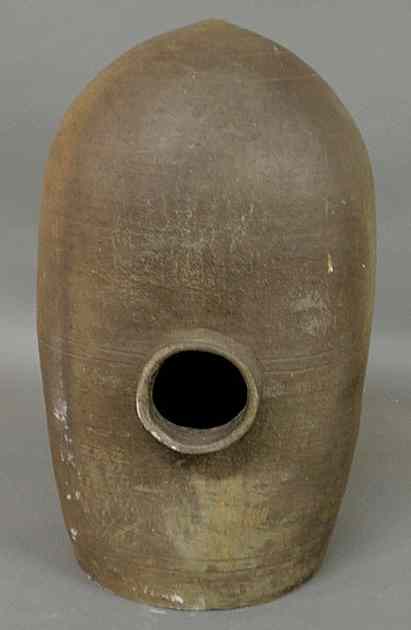 Appraisal: Large Southern stoneware beehive form feeder th c with incised