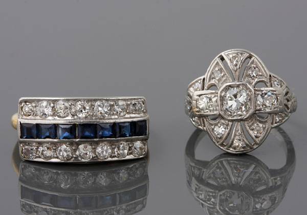 Appraisal: A diamond and platinum oval ring with a blue stone