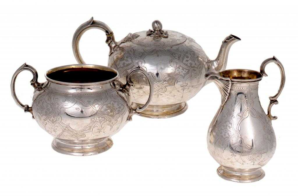 Appraisal: A VICTORIAN TEA SERVICE of compressed globular or baluster shape