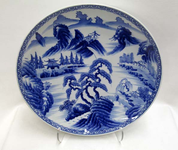 Appraisal: CHINESE PORCELAIN CHARGER having traditional blue and white landscape Diameter