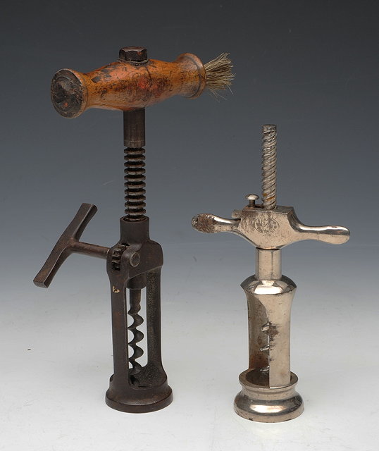 Appraisal: A GEORGIAN STEEL CORKSCREW with patent action and one other