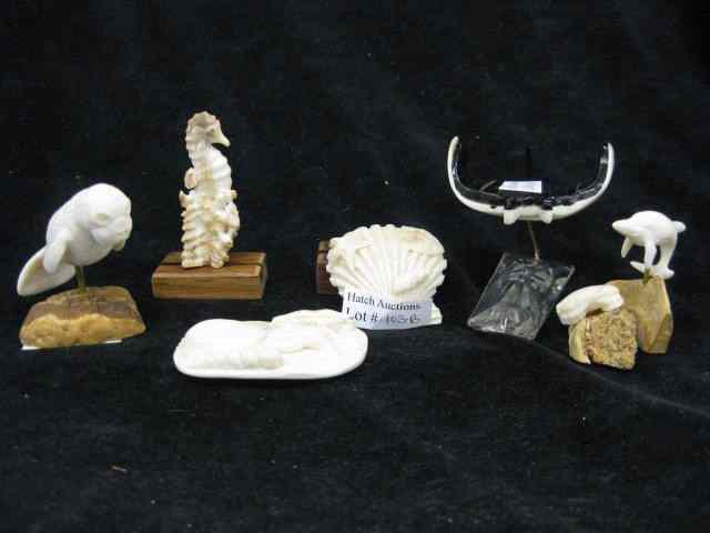 Appraisal: pcs of Carved Ivory seahorse manatee porpoise stingray shells ''