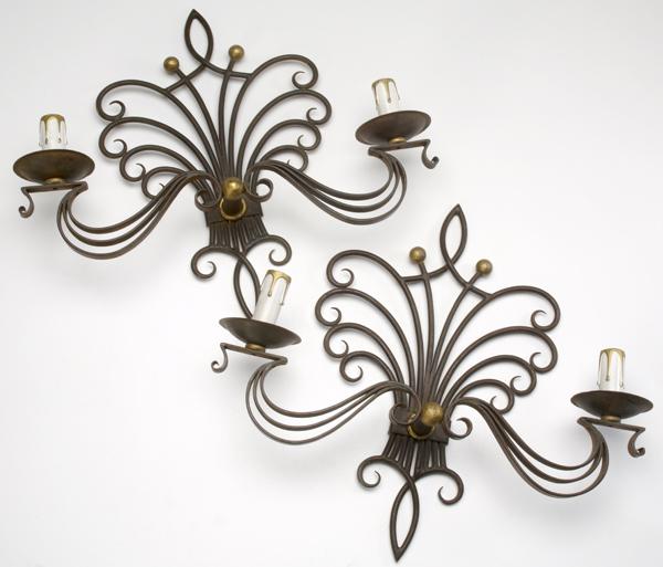 Appraisal: STYLE OF POILLERAT Pair of wrought iron sconces Each x