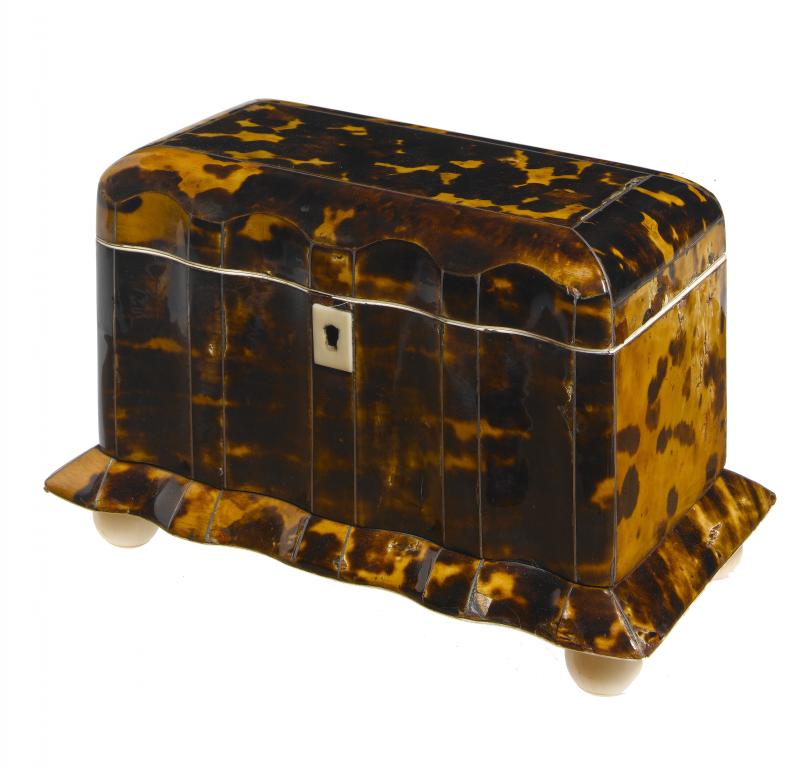 Appraisal: A VICTORIAN TORTOISESHELL TEA CADDY with domed lid and fluted