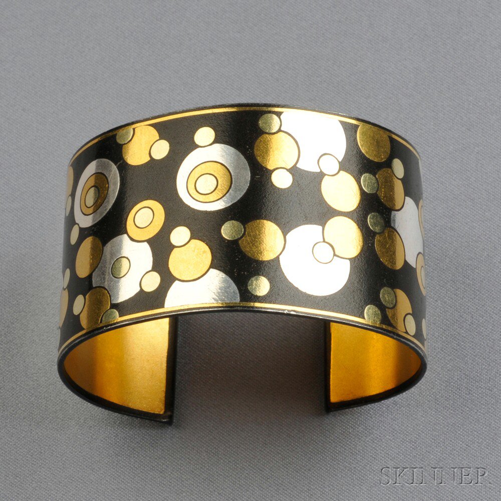 Appraisal: Mixed Metal Cuff Tiffany Co with circular motifs interior cir