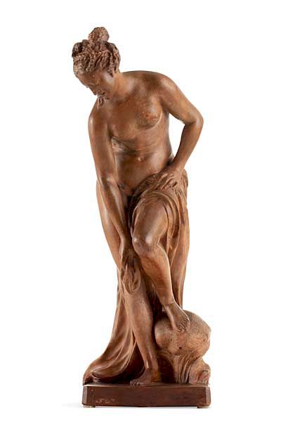 Appraisal: A Continental terracotta figure of a bather A Continental terracotta