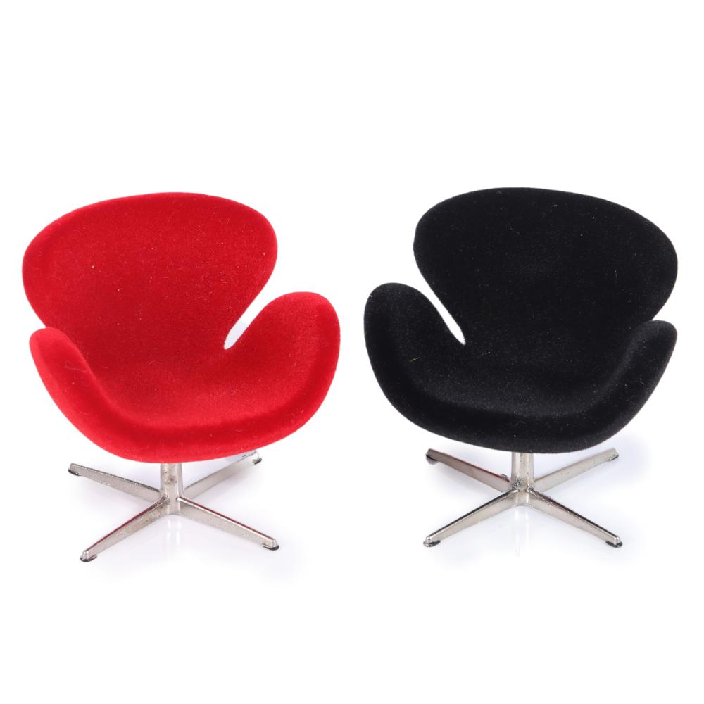 Appraisal: TWO MINIATURE MINIMII ARNE JACOBSEN DESIGNED SWAN CHAIRS IN RED