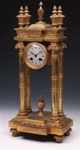 Appraisal: A TH CENTURY FRENCH PORTICO MANTEL CLOCK the convex white