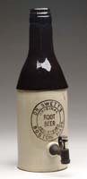 Appraisal: DR SWETT S STONEWARE SYRUP DISPENSER Figural root beer bottle