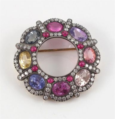 Appraisal: A sapphire ruby and diamond circular brooch Set with oval