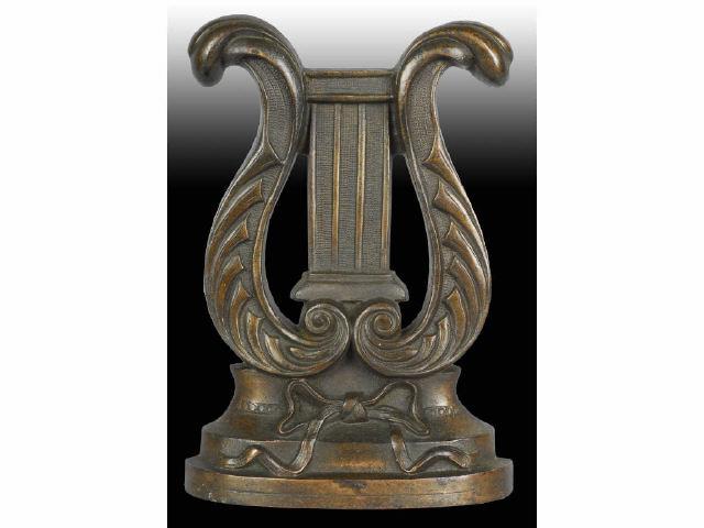 Appraisal: Lyre Musical Instrument Hubley Cast Iron Doorstop Description Made by