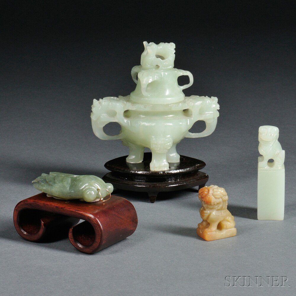 Appraisal: Four Hardstone Carvings China th century a small tripod incense