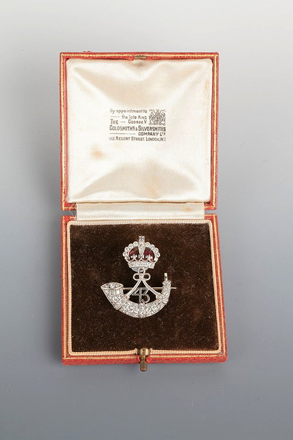 Appraisal: A DIAMOND AND ENAMEL BROOCH for the rd Regiment of