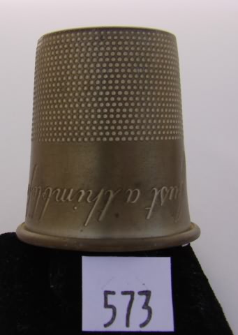 Appraisal: Large collectable pewter thimble Just a thimbleful