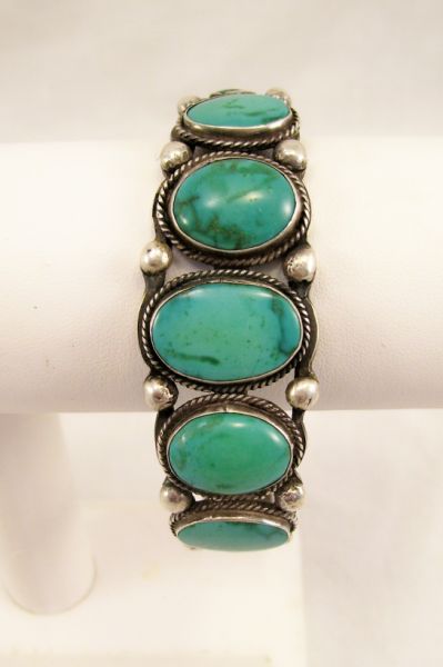 Appraisal: Sterling Turquoise Cuff Bracelet Sterling cuff bracelet with seven graduated