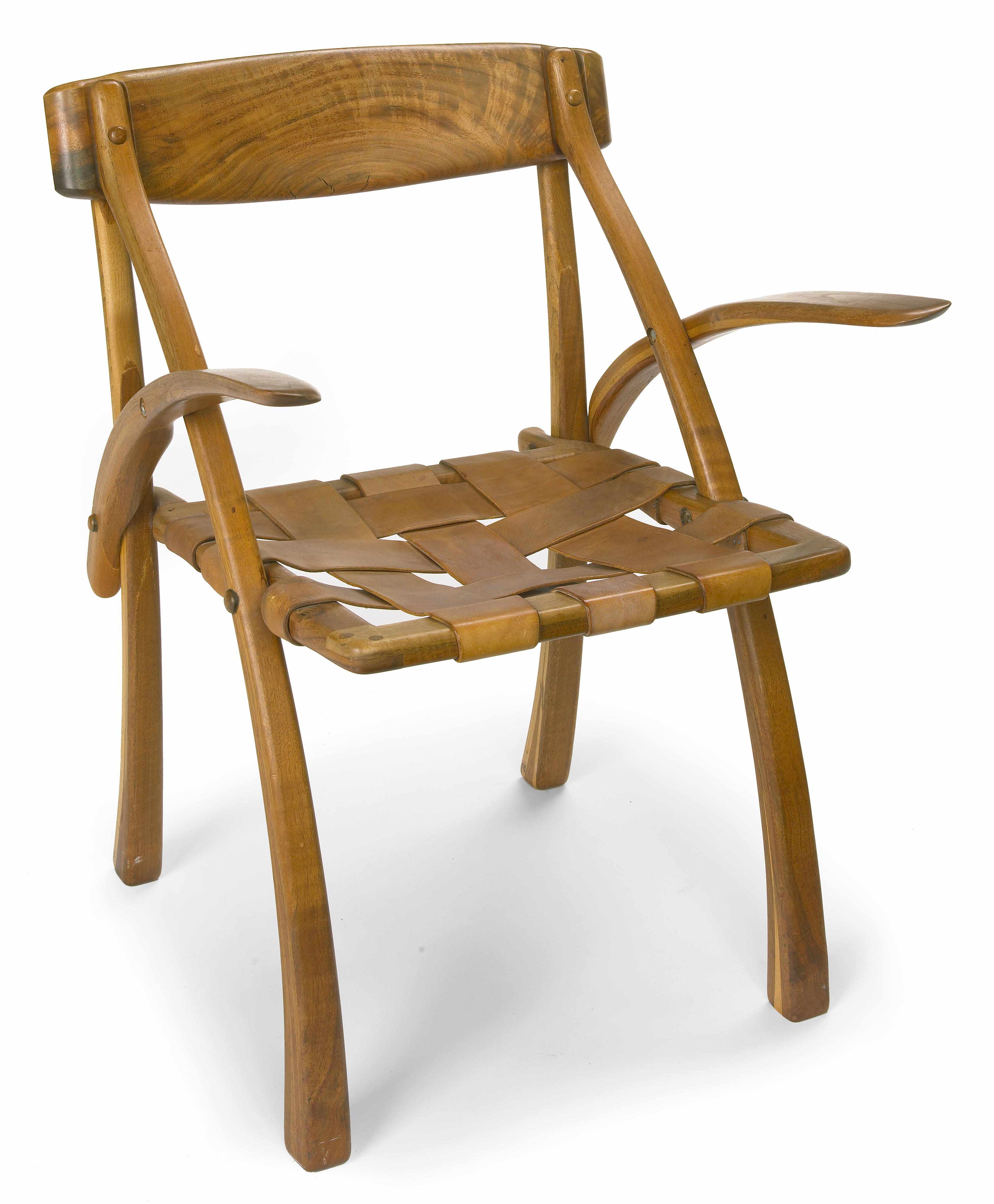 Appraisal: An Arthur Espenet Carpenter wishbone armchair signed and numbered height