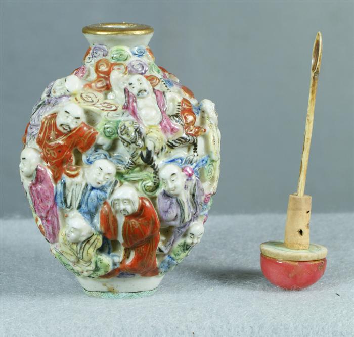 Appraisal: Chinese molded porcelain snuff bottle Famille Rose decoration mark to