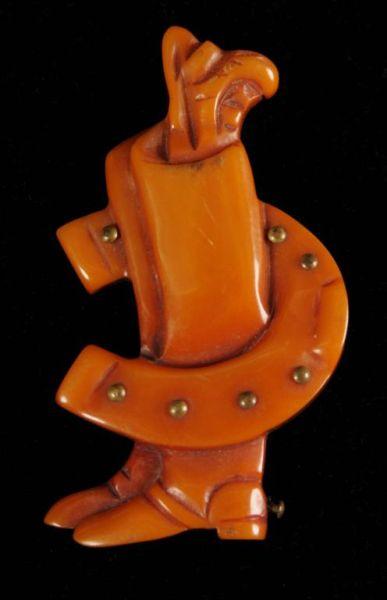 Appraisal: Bakelite Horseshoe Boots Pin Condition Excellent Size T