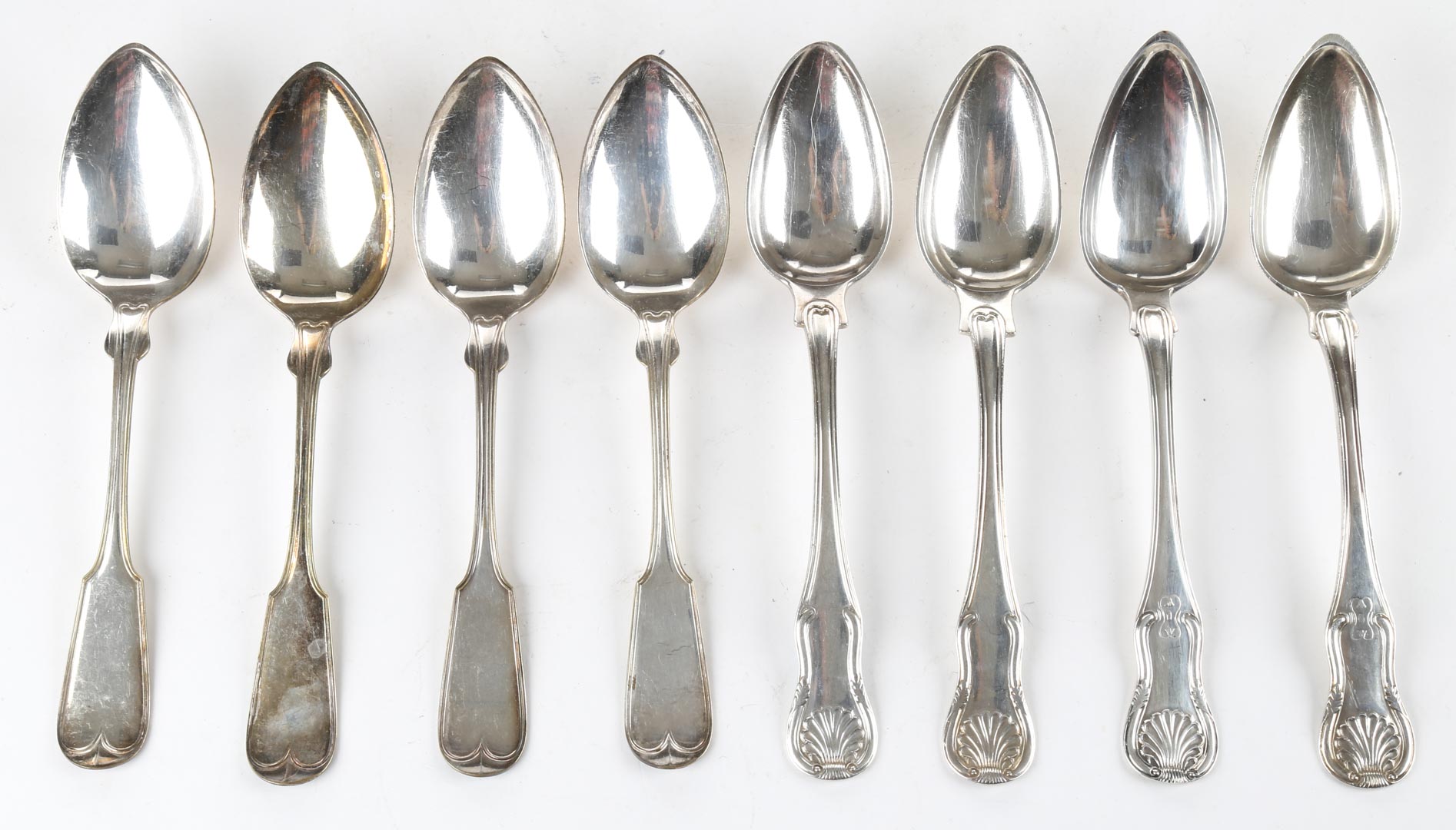 Appraisal: Four A E Warner coin silver soup spoons in the