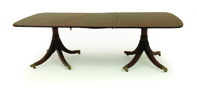 Appraisal: A REGENCY STYLE MAHOGANY TWIN PEDESTAL DINING TABLE th century