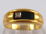 Appraisal: A French hallmarked carat gold diamond and onyx ring size