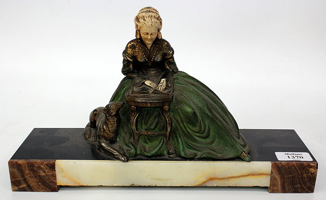 Appraisal: AN ART DECO COLD PAINTED METAL FIGURE of a lady