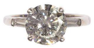 Appraisal: Diamond and platinum ring GIA Diamond and platinum ring centering