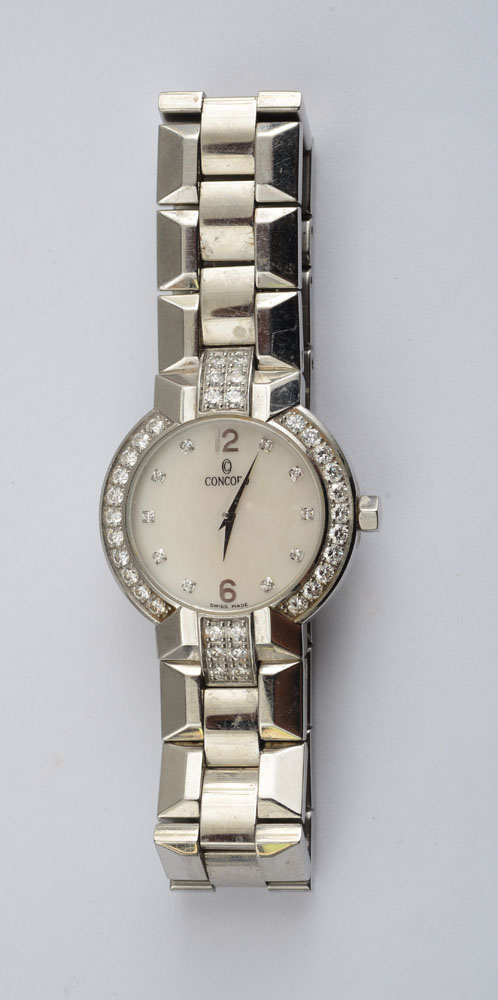 Appraisal: LADY'S STAINLESS STEEL AND DIAMOND WRISTWATCH CONCORD Mother-of-pearl dial and