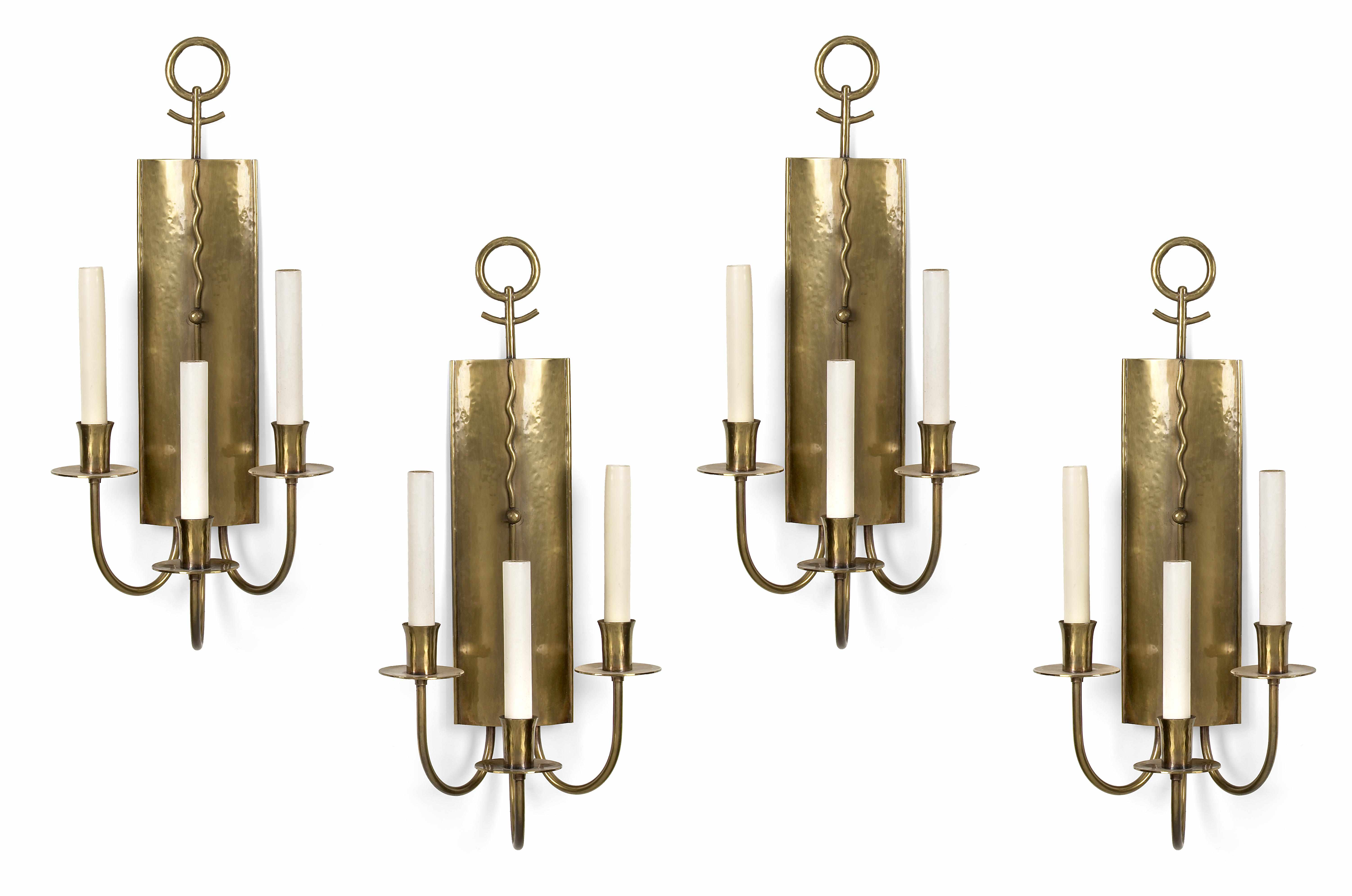 Appraisal: A set of four Hans Grag brass three-light sconces early