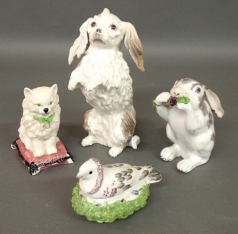 Appraisal: - Four English porcelain figures- cat on pillow spaniel h