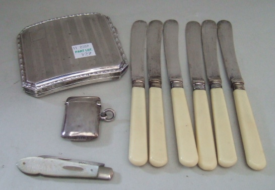 Appraisal: Silver comprising a cut cornered rectangular cigarette case with engine