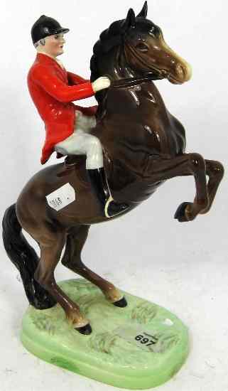 Appraisal: Beswick Model of a Huntsman on Rearing Horse