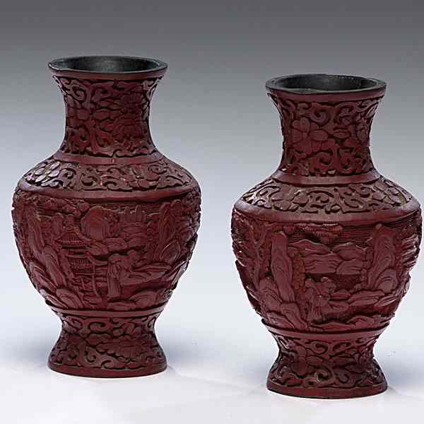 Appraisal: Pair of Chinese Cinnabar Vases Chinese th century A pair