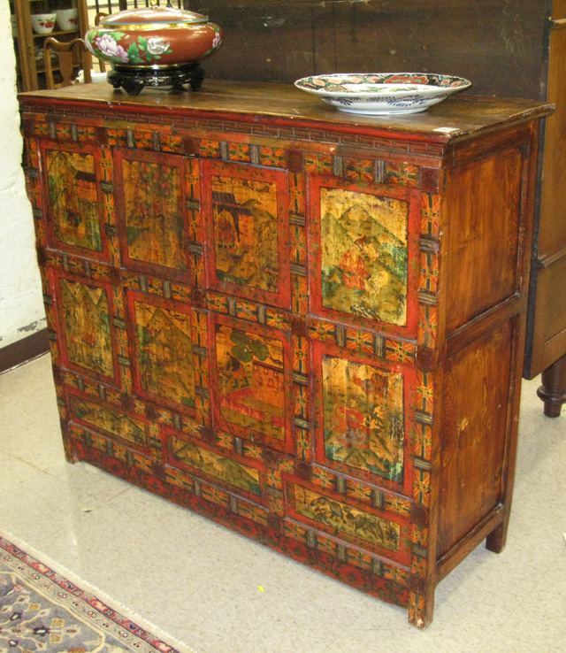 Appraisal: MONGOLIAN PAINT DECORATED WOOD CABINET divided into upper and lower