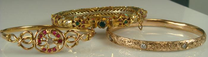 Appraisal: Gold-filled Bangle Bracelets Grouping of three including one med-eastern with