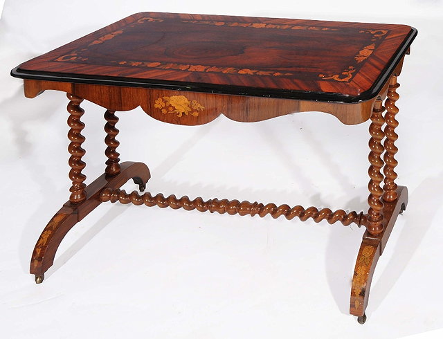 Appraisal: A VICTORIAN ROSEWOOD AND INLAID CENTRE TABLE on barley twist