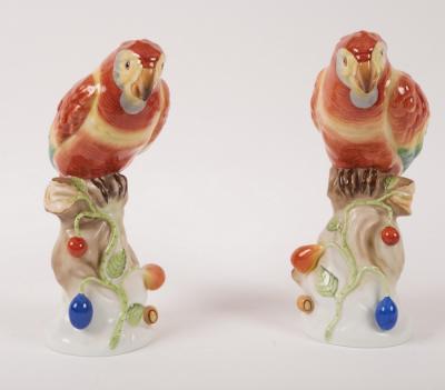 Appraisal: A pair of Herend models of red parrots perched on