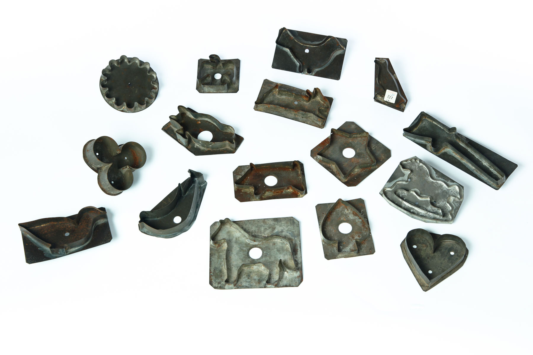 Appraisal: SIXTEEN TIN COOKIE CUTTERS American late th- th century Forms