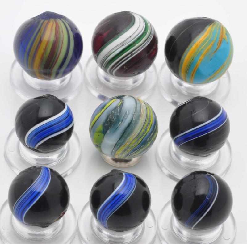 Appraisal: Lot of Indian Marbles Description This lot includes two Maglite