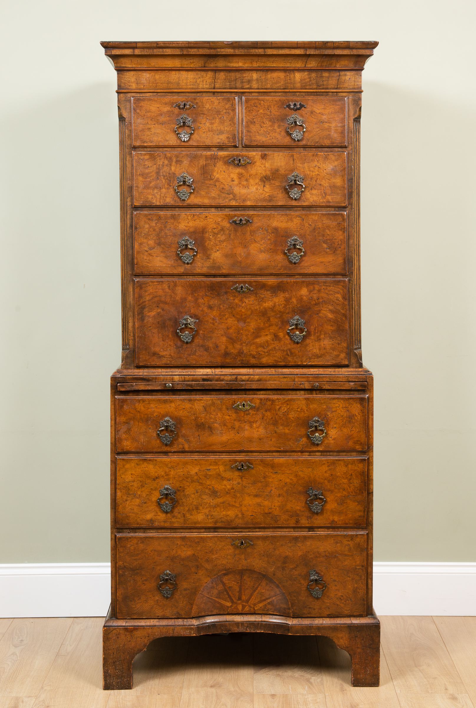 Appraisal: An th century-style walnut small sized chest on chest the