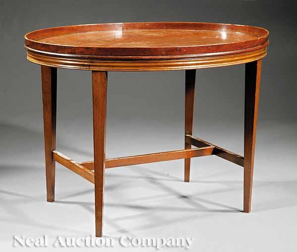 Appraisal: An Antique Georgian-Style Mahogany Inlaid Tray on Stand oval gallery